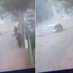 Sel sularının arasına daldı: Araçta mahsur kalan sürücüyü ön camdan kurtardı