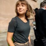 Göğsüne vurulmuş öğrenci protestoları, İsveçli aktivist Greta Thunberg ile birlikte
